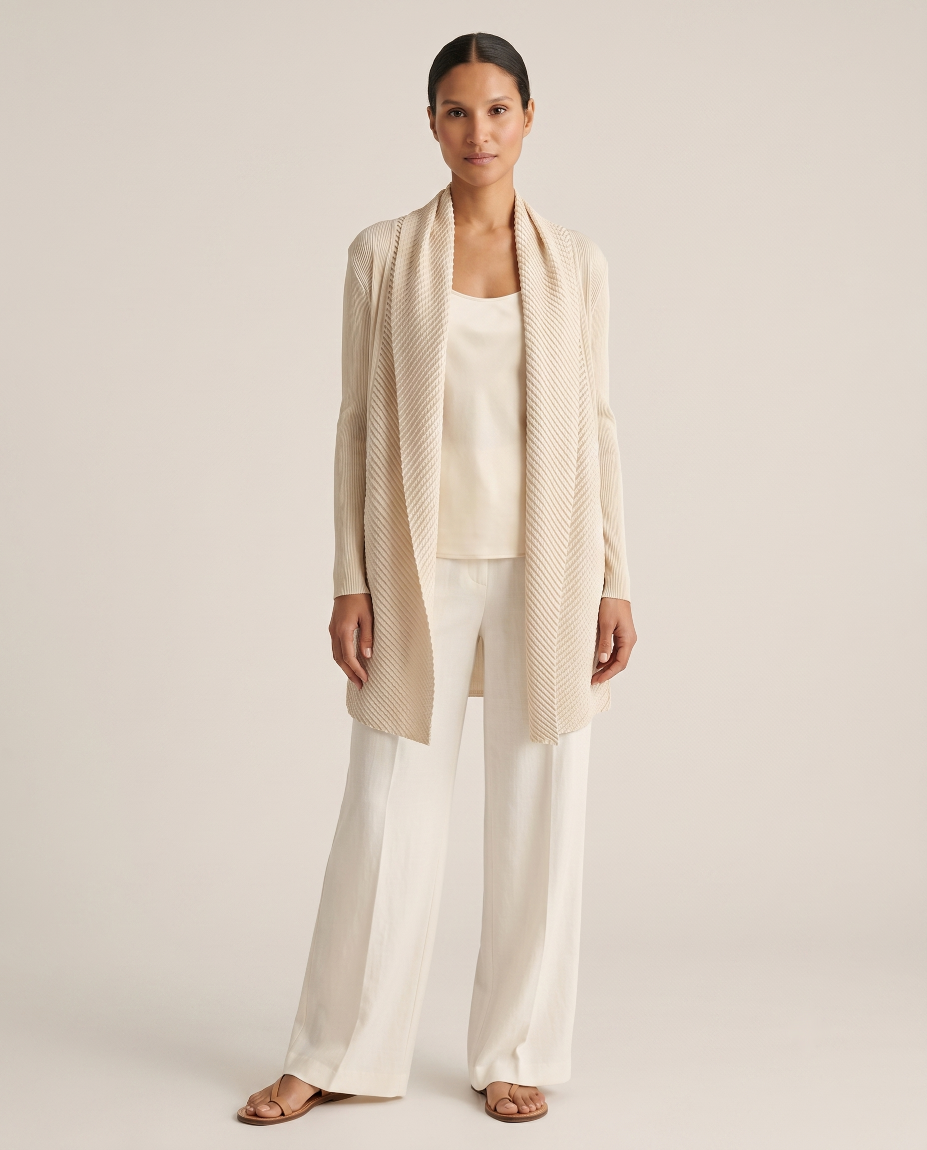 Chaqueta larga de punto crema